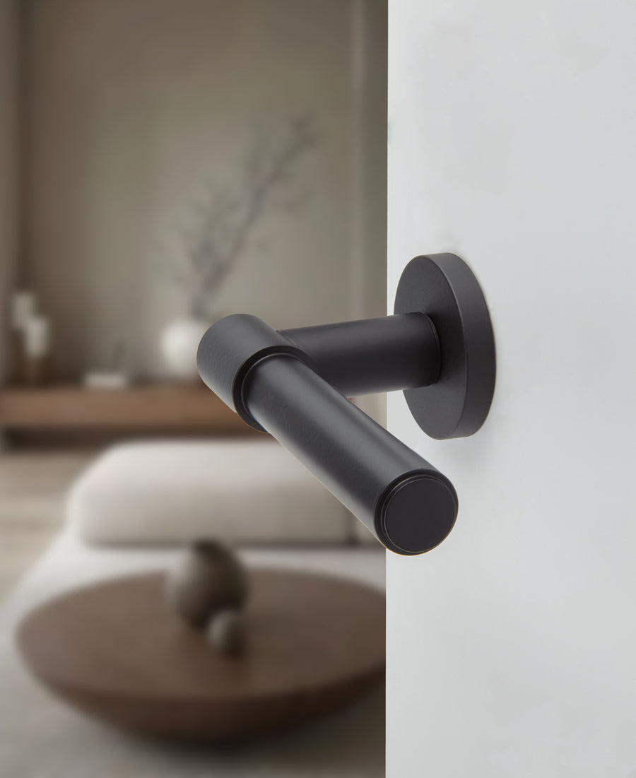 Blume door handle set on round rose