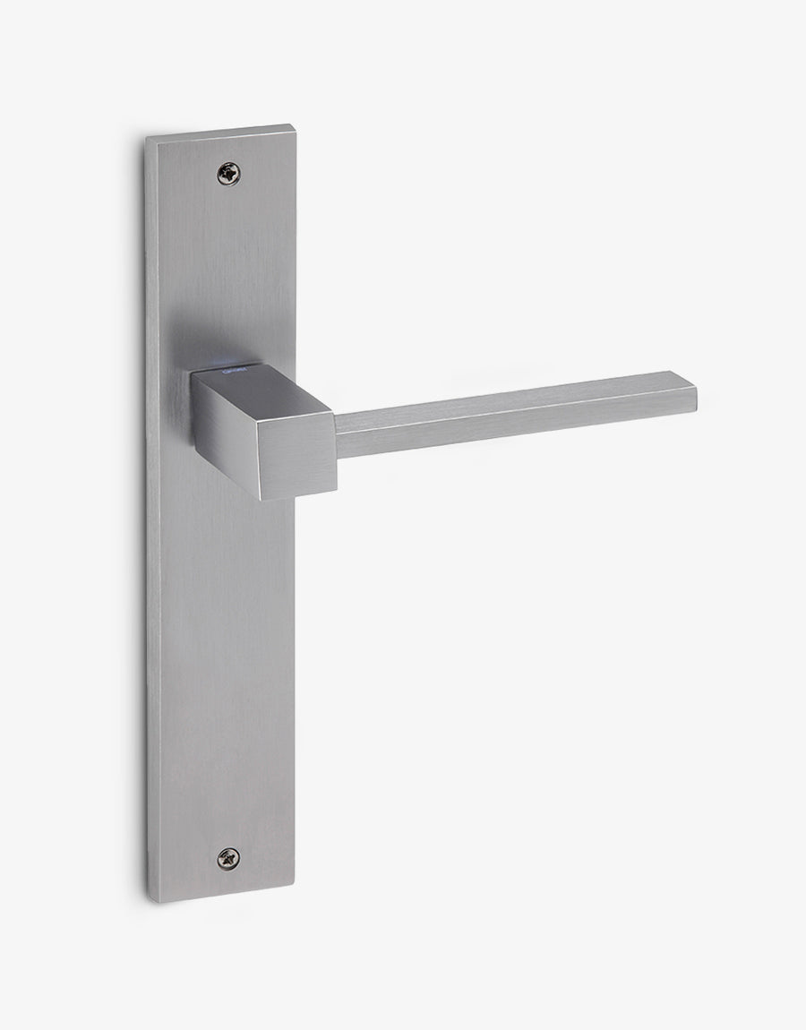 Plano door handle set on a rectangular backplate