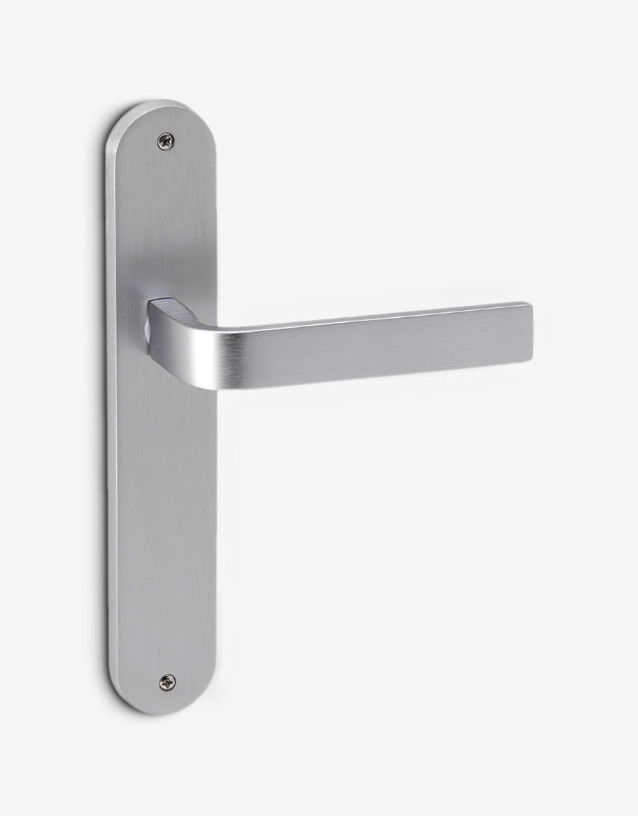 Slim door handle set on an oval backplate