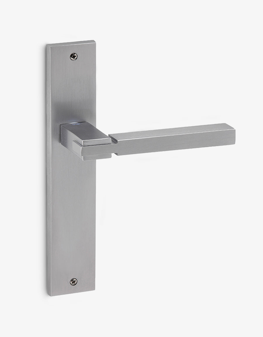 Quadra door handle set on a rectangular backplate