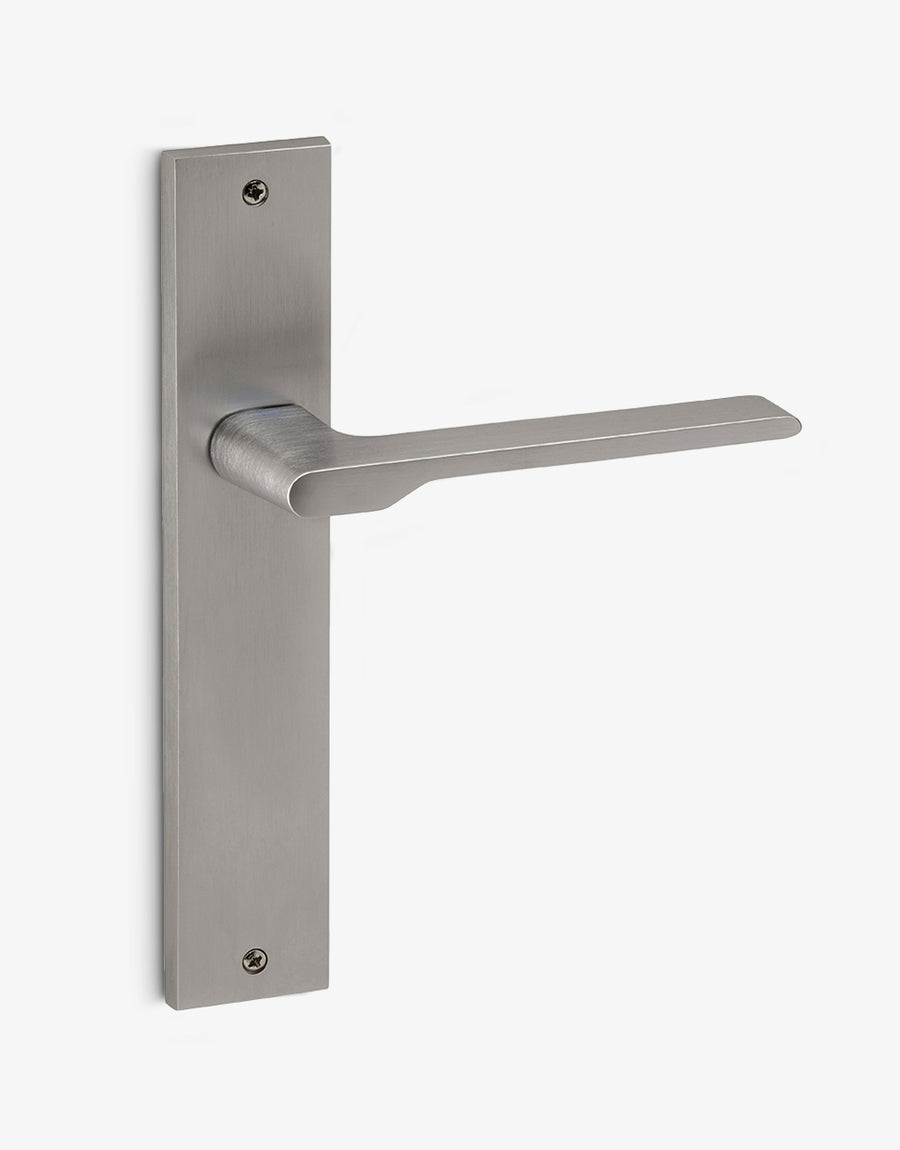 Special door handle set on a rectangular backplate